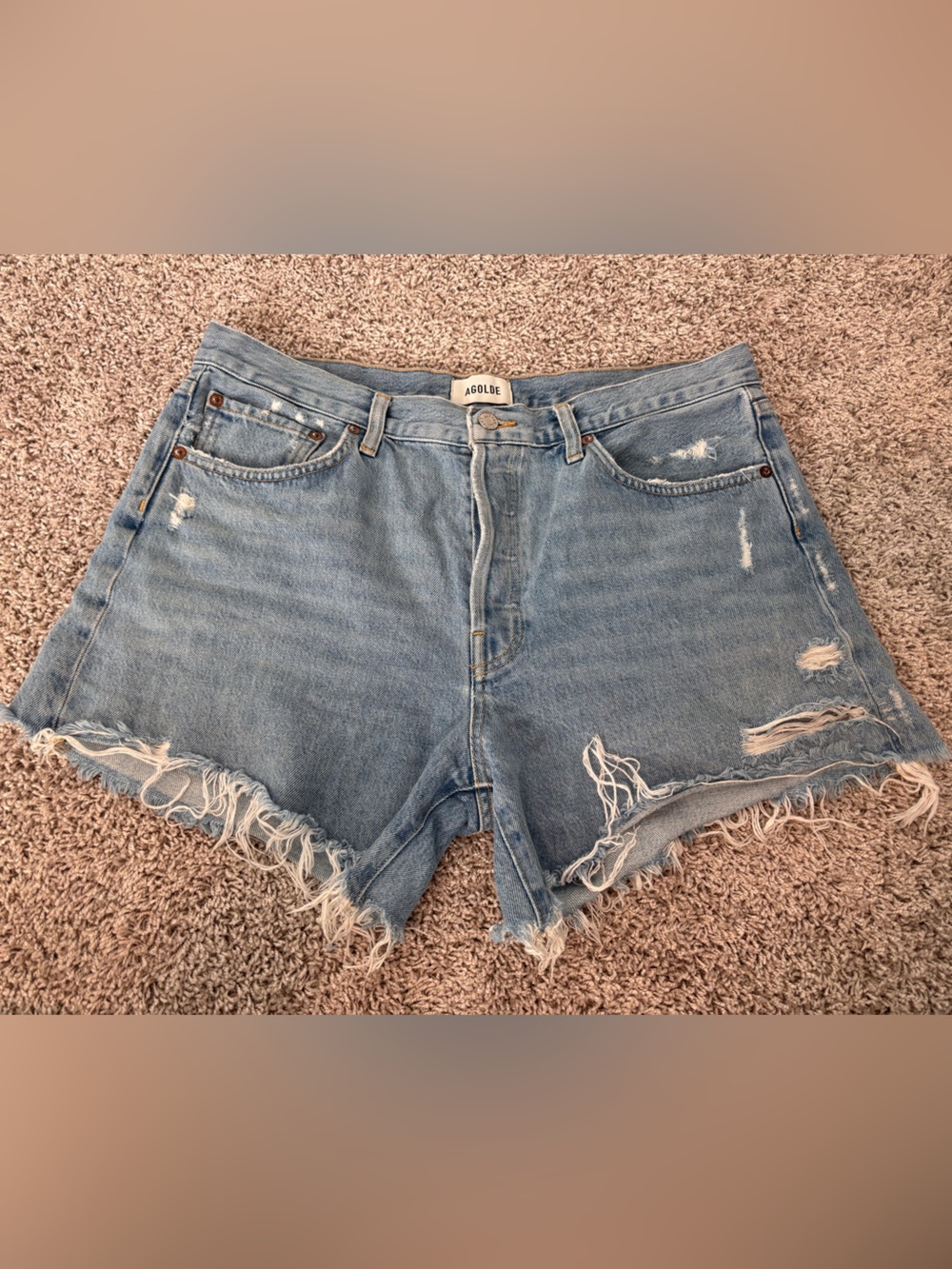 Agolde Light Blue Distressed Denim Cutoff Shorts